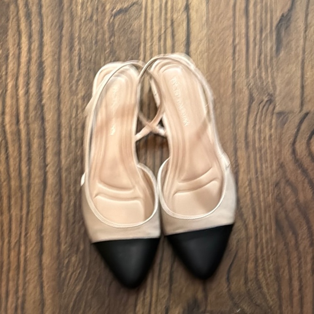 BCBGeneration Cream and Black Heels with Elegant Cap-Toe